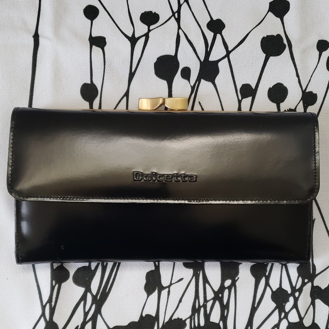 Dolcetta Black Patent Clutch Wallet With Gold Bow Lock